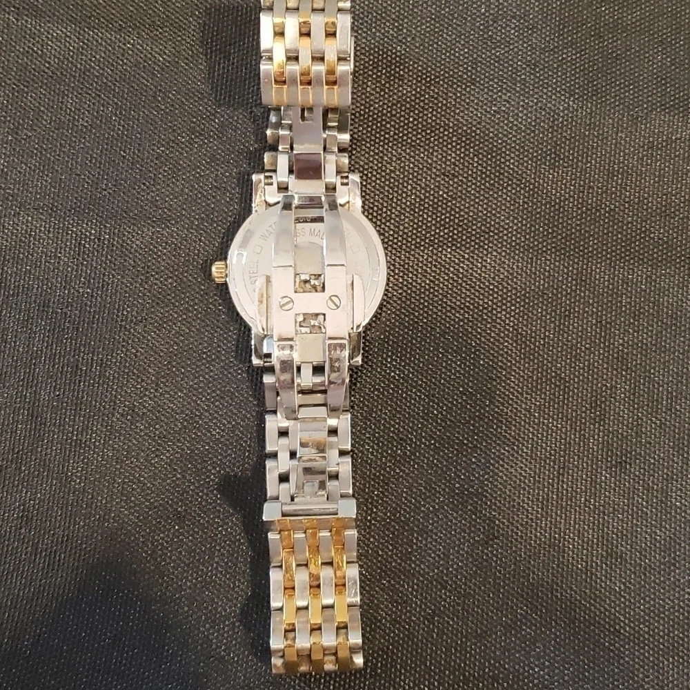 Raymond  Weil Toccata woman's watch with pearl face and Diamond accents.